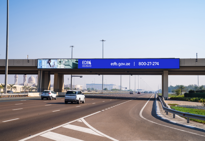 Sheikh Zayed Bin Sultan Street bridge banner site photo
